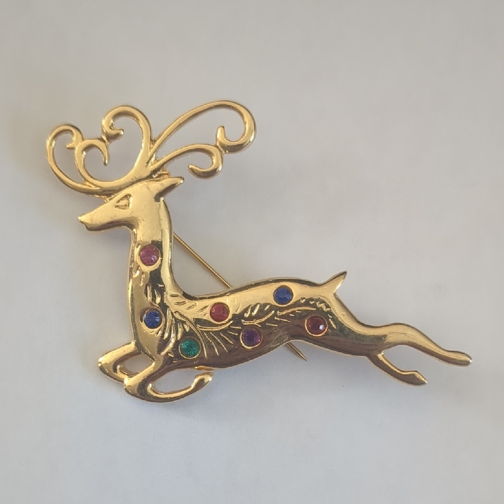 Elegant Gold Reindeer Brooch with Multicolor Accents